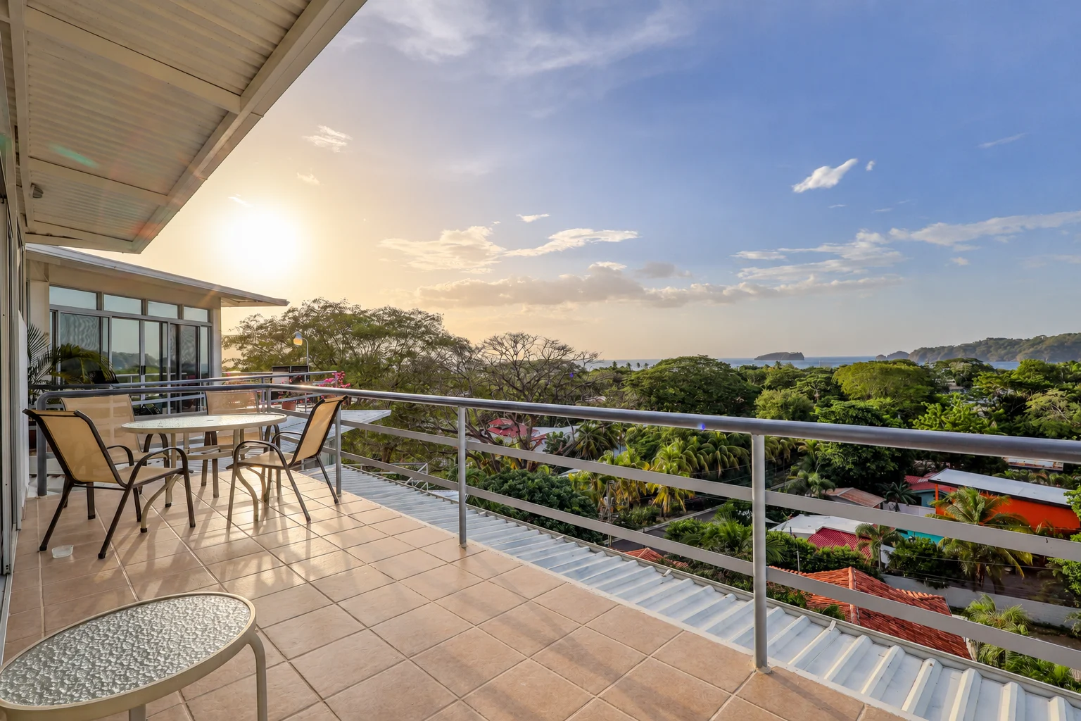 Balcony dining and ocean outlook at Tucanes 12 vacation rental in Playas del Coco